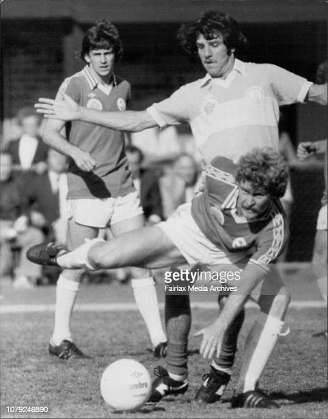 Peter Stone battling for the ball in a National Soccer League fixture